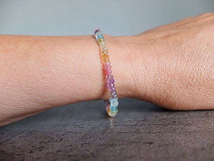 This rainbow bracelet has a great variety of natural gemstones. They are : Aquamarine, , Amethyst, Iolite, Peridot, Citrine, Apatite , clear quartz , pink tourmaline, iolite, Apatite A gorgeous fusion of colors in this multi stone precious bracelet. A riot of pastel colors in ombre design I chose and lined the gemstones to obtain this unique shaded colorful precious bracelet. It will be beautiful alone or together with other gemstones stacking bracelets The gemstone beads are strung on the highe Rainbow Bracelet Jewelry For Healing, Hypoallergenic Rainbow Bracelet Jewelry, Multicolor Gemstone Fluorite Jewelry, Multicolor Fluorite Gemstone Jewelry, Quartz Pink, Ombre Design, Stacking Bracelets, Rainbow Gemstones, Rainbow Bracelet