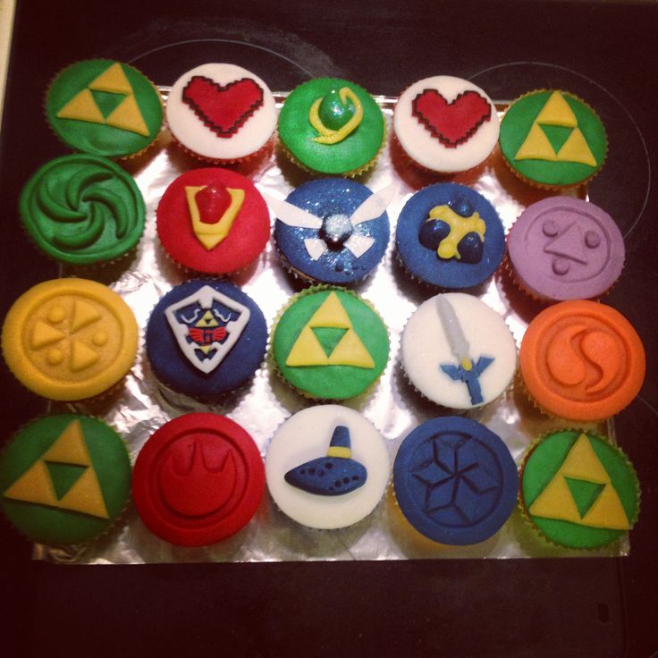 the cupcakes are decorated in different colors