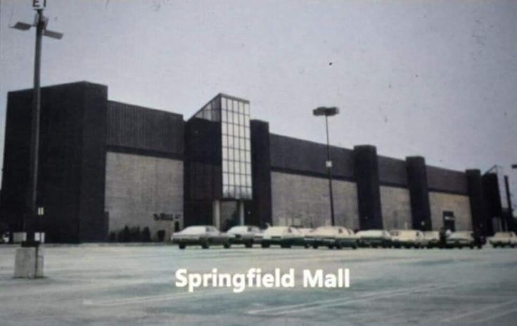 an old black and white photo of a building