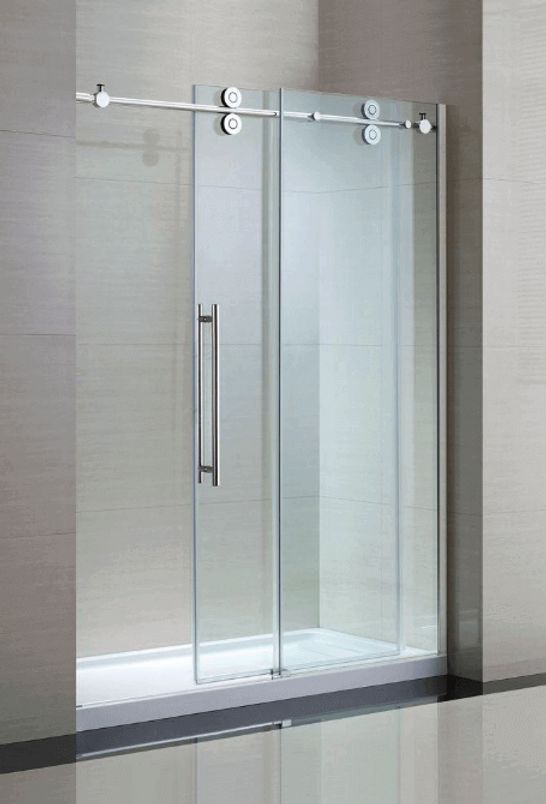 a glass shower door in the corner of a room with tile flooring and walls