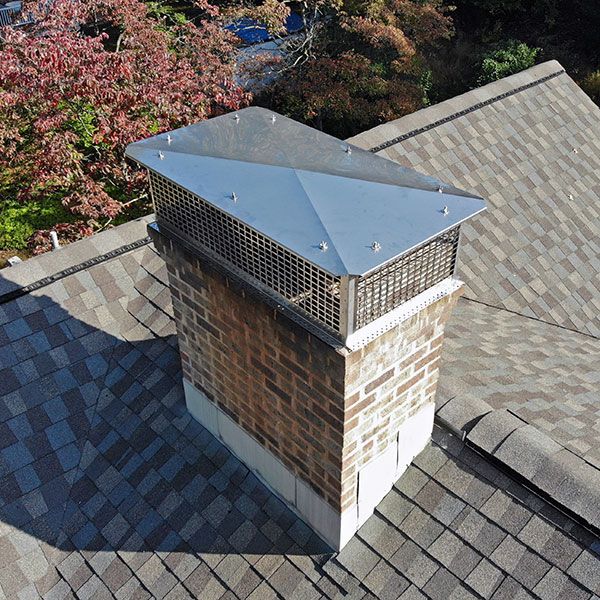 a chimney on the roof of a house