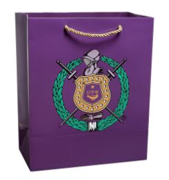 a purple shopping bag with two swords and a crest on the front, sitting against a white background