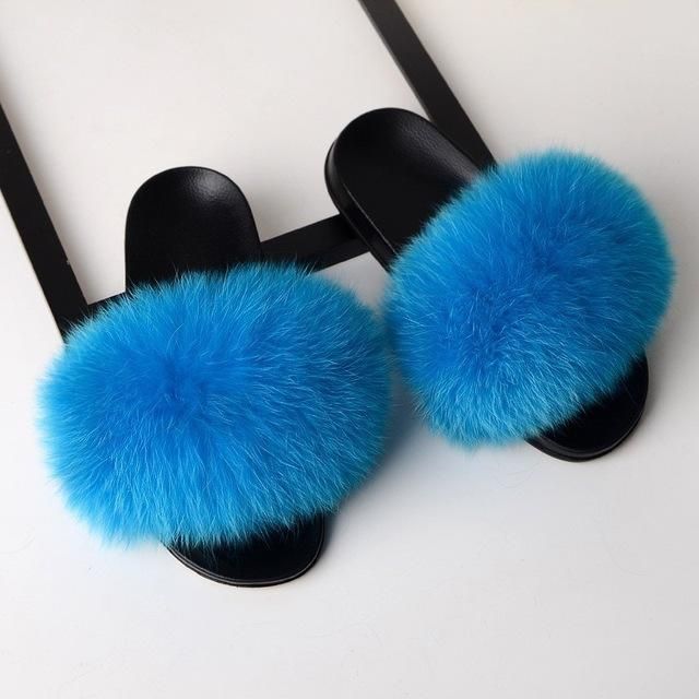 blue fox fur fluffy slides slippers for ladies with black rubber soles blue for slides Trendy Blue Slippers With Round Toe, Trendy Blue Round Toe Slippers, Rubber Slippers, Fur Sandals, Blue Chocolate, Faux Fur Slippers, Fashion Slippers, Warm Slippers, Slides Women