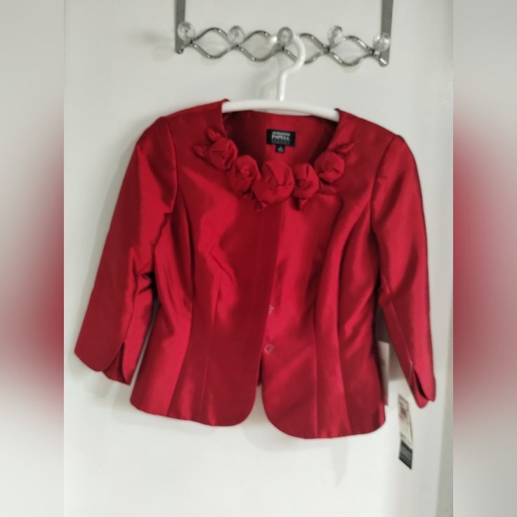 Never Used Red Evening Blazer For Spring, Red Long Sleeve Holiday Blazer, Holiday Red Long Sleeve Blazer, Red Holiday Blazer With Long Sleeves, Formal Red Holiday Outerwear, Red Formal Holiday Outerwear, Red Long Sleeve Outerwear For Evening, Red Long Sleeve Evening Outerwear, Tailored Red Outerwear For Evening