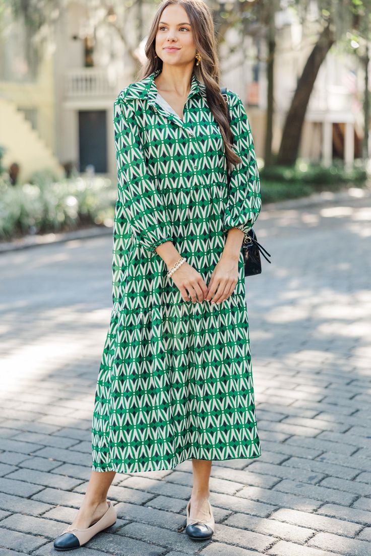 This abstract midi dress is so bold and fun! We love those bold hues, especially on that classic flattering cut. This midi dress is going to be such a fun dress to style this fall! Partial button down collared neckline Long sleeves Abstract print No stretch Sydney is wearing the small. Floral Cocktail Dress, Black Tie Dress, Girl's Back, Fun Dress, Girls Graphic Tee, Green Abstract, Cute Rompers, Girl Sweatshirts, Romper With Skirt