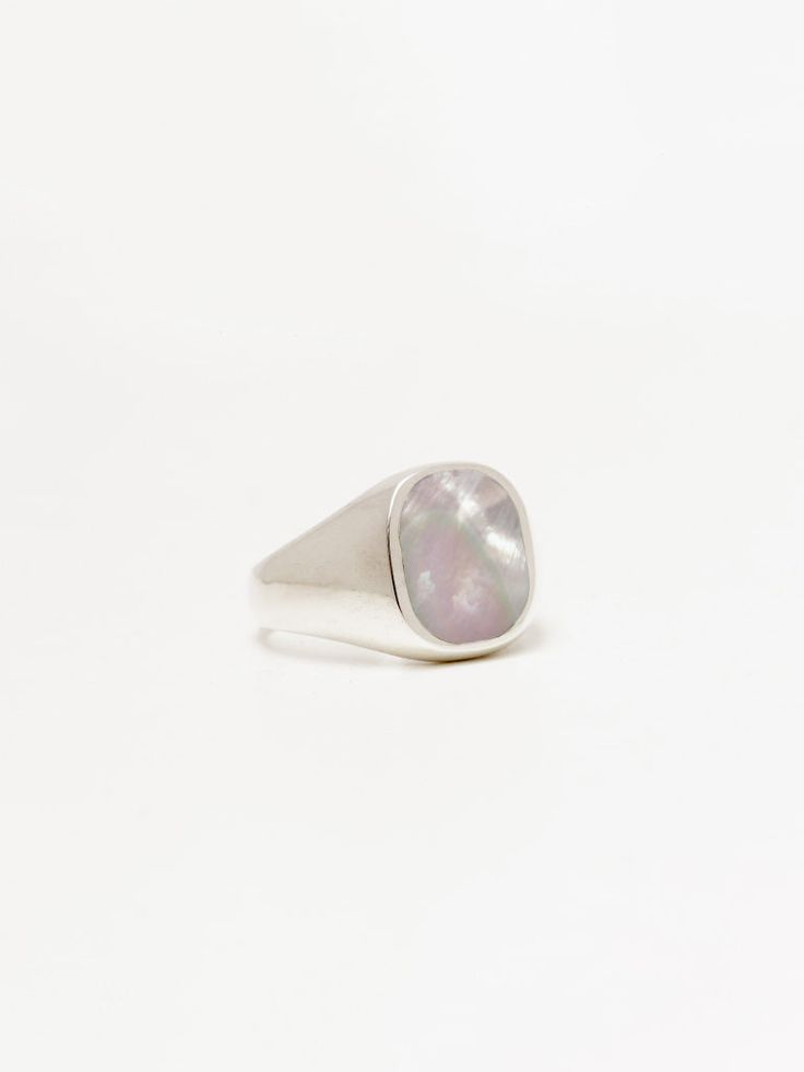 Our Mother of Pearl Signet Ring is a sophisticated statement piece that can be crafted in either sterling silver, 14k or 18k gold. Each piece is ethically and sustainably sourced, and lovingly handcrafted in Los Angeles with exceptional attention to detail, making it a piece of luxury to be treasured.