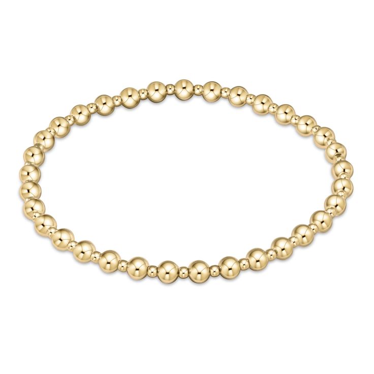 Introducing our new pattern, grateful. This bracelet is a classic gold beaded bracelet with alternating bead sizes. The larger bead size is a 4mm and the smaller bead size is a 2mm. Made with 4mm and 2mm, 14kt gold-filled beads Worry-free wear‚ which means sleep, shower and sweat in it Hand beaded on high performance elastic for a slight stretch to easily roll on and off your wrist Measures 6.75" Stacks well with all bracelets Gold Beaded Bracelet, Bead Sizes, Gold Bead Bracelets, Classic Gold, Bracelet Collection, Roll On, Gold Filled Jewelry, Bracelet Stack, Sterling Silver Bead