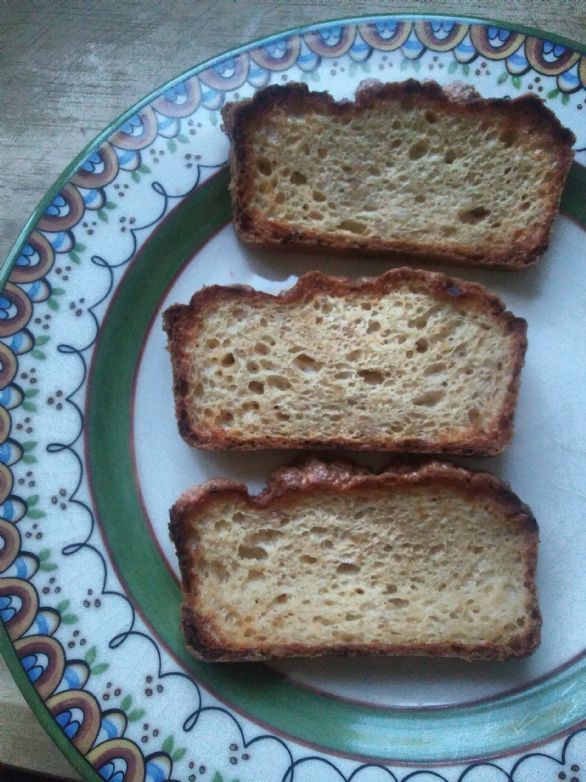 three slices of bread sitting on top of a plate