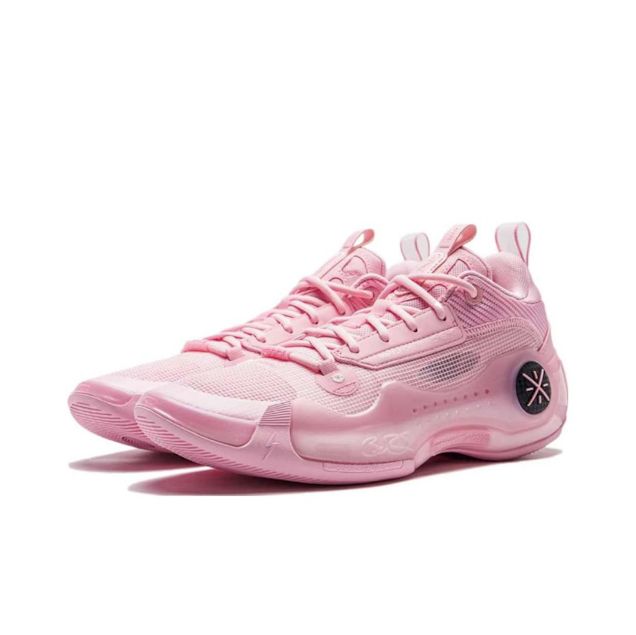 the nike air zoom low is pink and has a black logo on the upper part