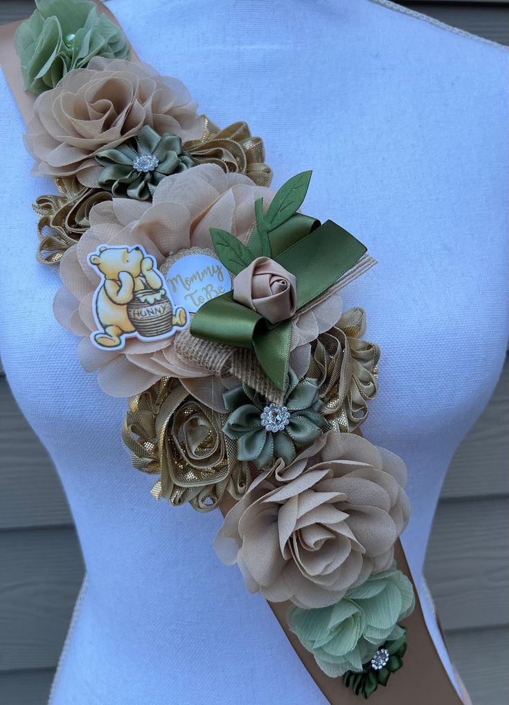 a close up of a woman's belt with flowers on it