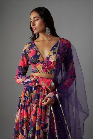 Multi color lehenga with all over bloom carnival print, hand embroidered details and ruffled tiers detailing. Paired with a matching print full sleeves V neck blouse and a sequin lace border embellished dupatta. - Aza Fashions Digital Print Sharara For Party And Festivals, Festival Sharara With Digital Print For Parties, Party Lehenga With Printed Motifs For Navratri, Fitted Anarkali Set With Digital Print For Festivals, Anarkali Choli With Digital Print For Party, Festive Lehenga With Printed Motifs For Parties, Party Lehenga With Printed Motifs For Festivals, Festival Party Lehenga With Printed Motifs, Party Anarkali Choli With Digital Print