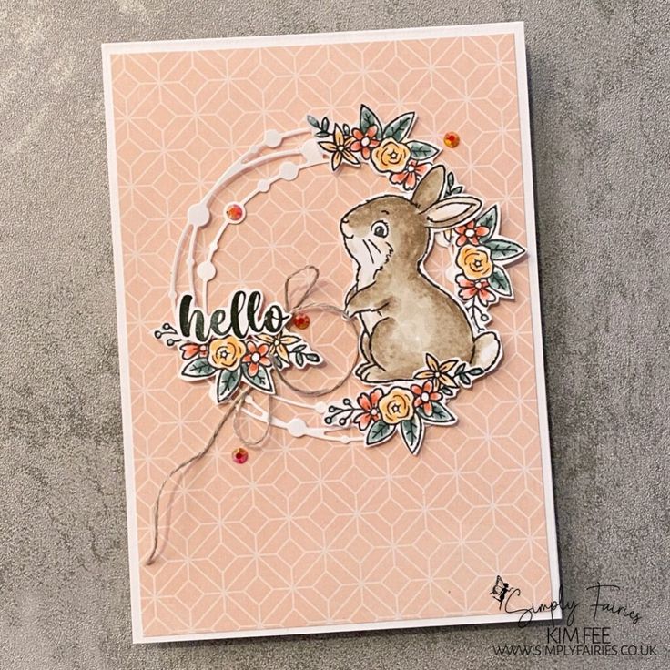 a handmade card with a rabbit on it's face and the words hello written in