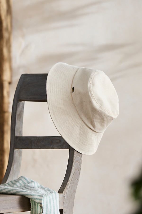 Handmade from lightweight and breathable cotton, this bucket-style version of our colorful crusher hat is perfect for a day at the beach or in the garden. Packable construction pairs with UPF 50 sun protection (96-99% of sun's rays) and an inner drawstring to assure a comfortable fit. | Cotton Bucket Hat in Beige at Terrain Casual Bucket Hat With Uv Protection And Flat Brim, Casual Bucket Hat With Uv Protection Flat Brim, Cotton Bucket Hat With Uv Protection For Vacation, Adjustable Cotton Bucket Hat With Uv Protection, Casual Flat Brim Bucket Hat For Beach Season, Adjustable Cotton Beach Hat, Adjustable Cotton Sun Hat With Short Brim, Adjustable Cotton Summer Hat, Adjustable Cotton Hat For The Beach