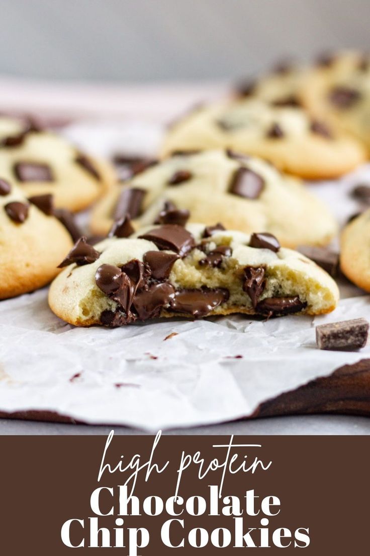 high protein chocolate chip cookies on parchment paper with text overlay that reads high protein chocolate chip cookies