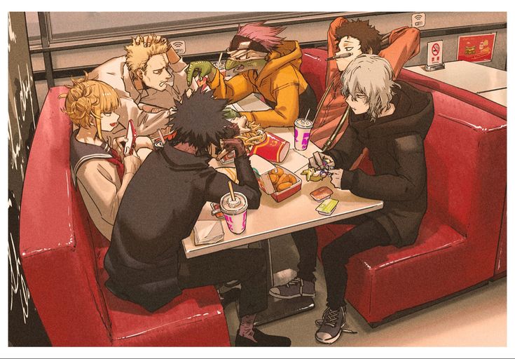 a group of people sitting at a table in a train car eating pizza and drinking soda