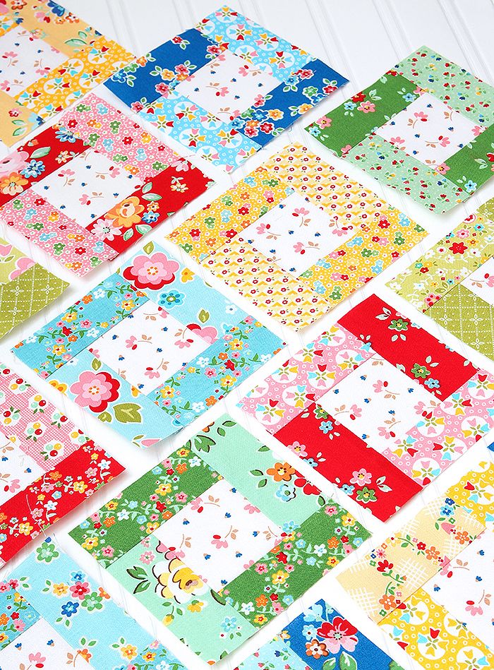 the colorful patchwork is laid out on the table