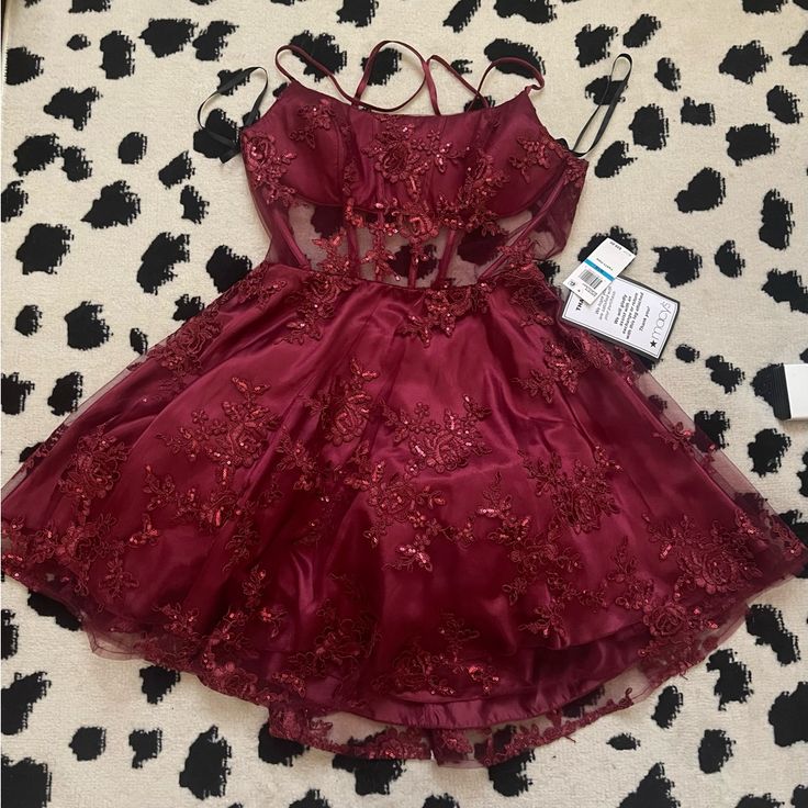 Red Tulle Dress With Floral Appliqu. Mesh Detail And Cross Back. Nwt Size 8/10 Red Mini Length Homecoming Dress, Red Mini Dress For Prom Season, Burgundy Cocktail Dress For Prom Season, Glamorous Red Mini Dress For Homecoming, Red Homecoming Summer Dress, Red Summer Dress For Homecoming, Red Dress For Summer Homecoming, Red Dresses For Summer Homecoming, Red Dress For Homecoming And Party Season