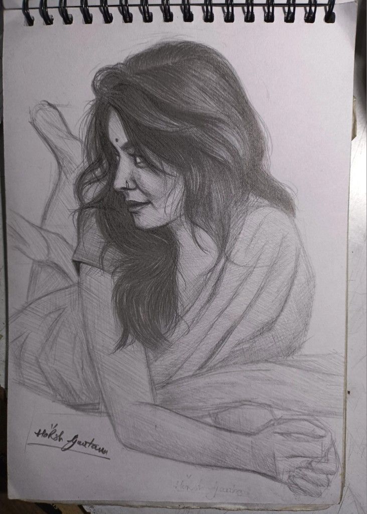 a pencil drawing of a woman with long hair