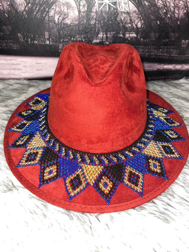 Beautiful handmade toquillas made by hand by Mexican artisans, you have an old and lifeless hat, give it a new and fun touch with a toquilla artesanal.NO INCLUDES HAT. Handmade Red Party Hat, Handmade Fedora With Short Brim As Gift, Handmade Short Brim Fedora As Gift, Bohemian Adjustable Fedora For Parties, Red Brimmed Festival Costume Hats And Headpieces, Red Brimmed Festival Costume Hat, Red Brimmed Costume Hat For Festival, Red Brimmed Costume Hats And Headpieces For Festivals, Bohemian Red Wide Brim Fedora