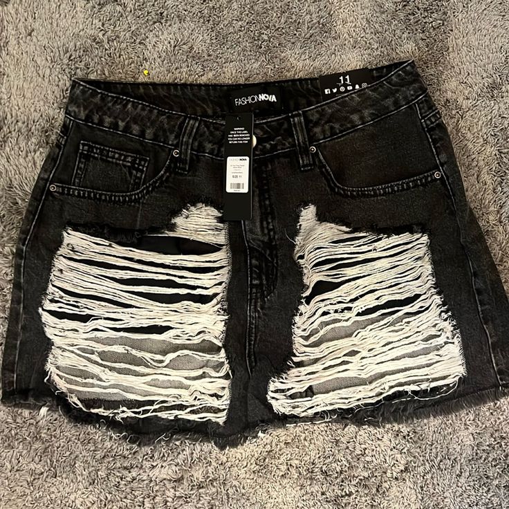 Black Denim Shorts Size Woman’s 11 Black Cutoff Bottoms For Streetwear, Black High Waist Jean Shorts For Streetwear, High Waist Black Jean Shorts For Streetwear, Black Bottoms With Frayed Hem For Streetwear, Black Streetwear Bottoms With Frayed Hem, Trendy Black Cutoff Jeans, Ripped Black Jean Shorts For Streetwear, Black Mid-rise Jean Shorts For Streetwear, Black Distressed Jean Shorts For Streetwear