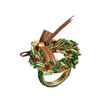 a green and red christmas wreath brooch with bells on it's end, hanging from a string