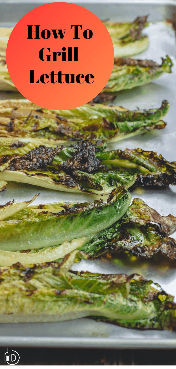 grilled asparagus on a baking sheet with text overlay how to grill lettuce