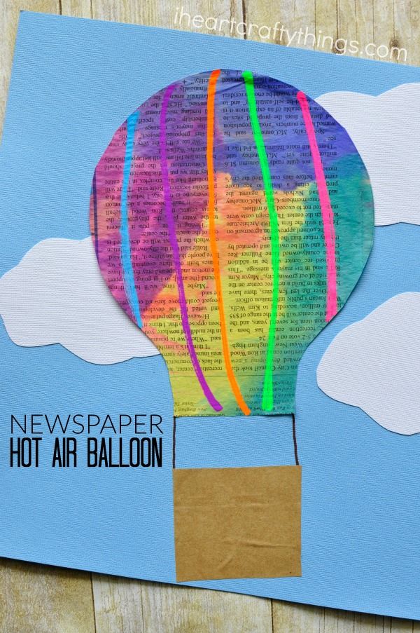 a hot air balloon made out of newspaper on a piece of paper with the words news paper