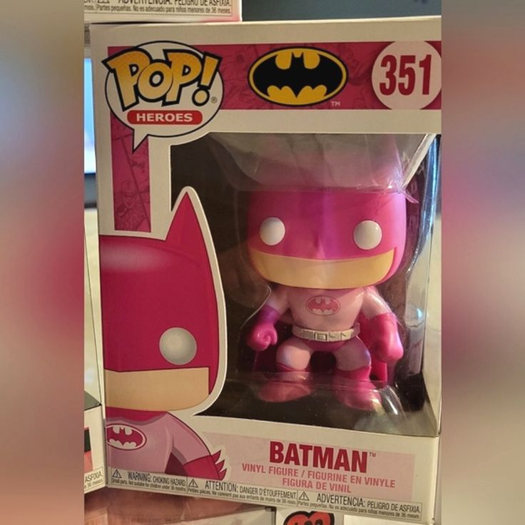 the pink batman pop vinyl figure is in its box