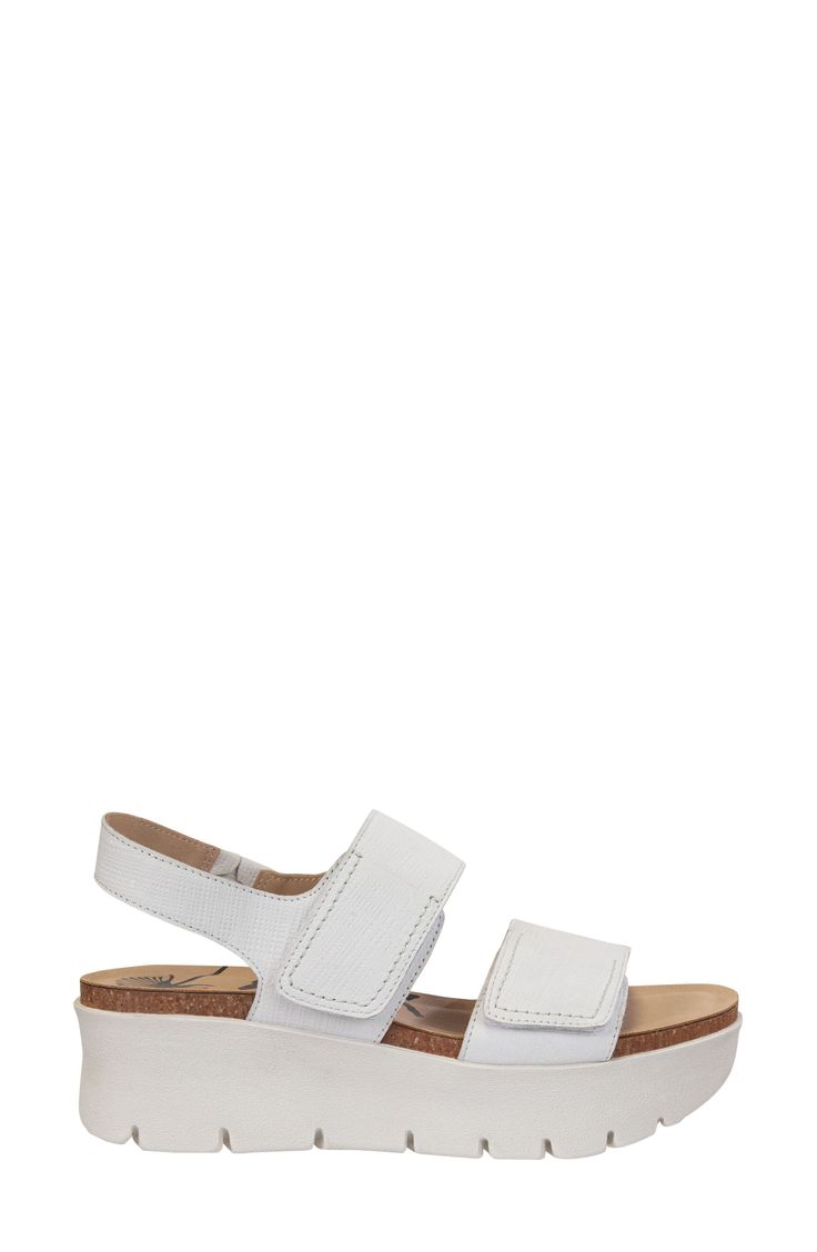 A vacay-ready sandal with a lightweight, sporty platform and adjustable straps promises a personalized fit and comfy stepping. Flat sole 1 3/4" platform Leather upper/textile lining/synthetic sole Imported Lightweight White Casual Sandals, White Lightweight Casual Sandals, Casual Lightweight White Sandals, Casual White Sandals With Adjustable Strap, White Open Toe Sport Sandals With Adjustable Strap, White Lightweight Sport Sandals For Summer, Lightweight White Sport Sandals For Summer, White Sport Sandals With Cushioned Footbed, White Leather Sport Sandals With Textured Footbed