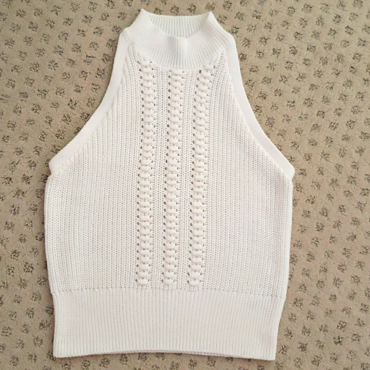 Nwt The Limited Knit Sleeveless Top Knot Details At Center Color: White/Cream Size Xs Flat Measurements: Bust 15.5" Waist 14" Length 20.5" White Tank Knit Top For Spring, White Knit Sweater Vest For Spring, Stretch White Sweater Vest For Summer, White Stretch Sweater Vest For Summer, White Knitted Tank Top, White Knit Sleeveless Sweater Vest, White Sleeveless Sweater Vest For Summer, Chic White Knit Sweater Vest, Chic White Cotton Sweater Vest