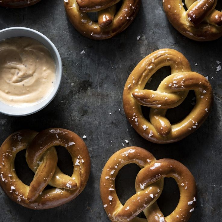 pretzels and dip in a bowl on a table