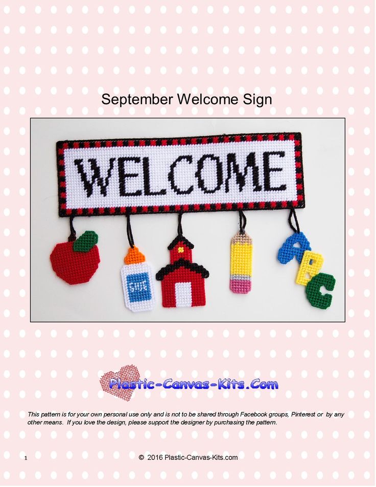 a welcome sign is hanging on the wall with magnets attached to it's sides