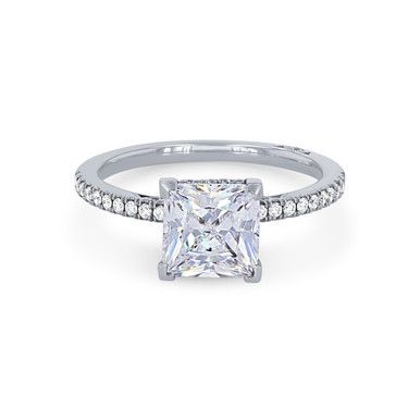 a princess cut diamond ring with pave set shoulders