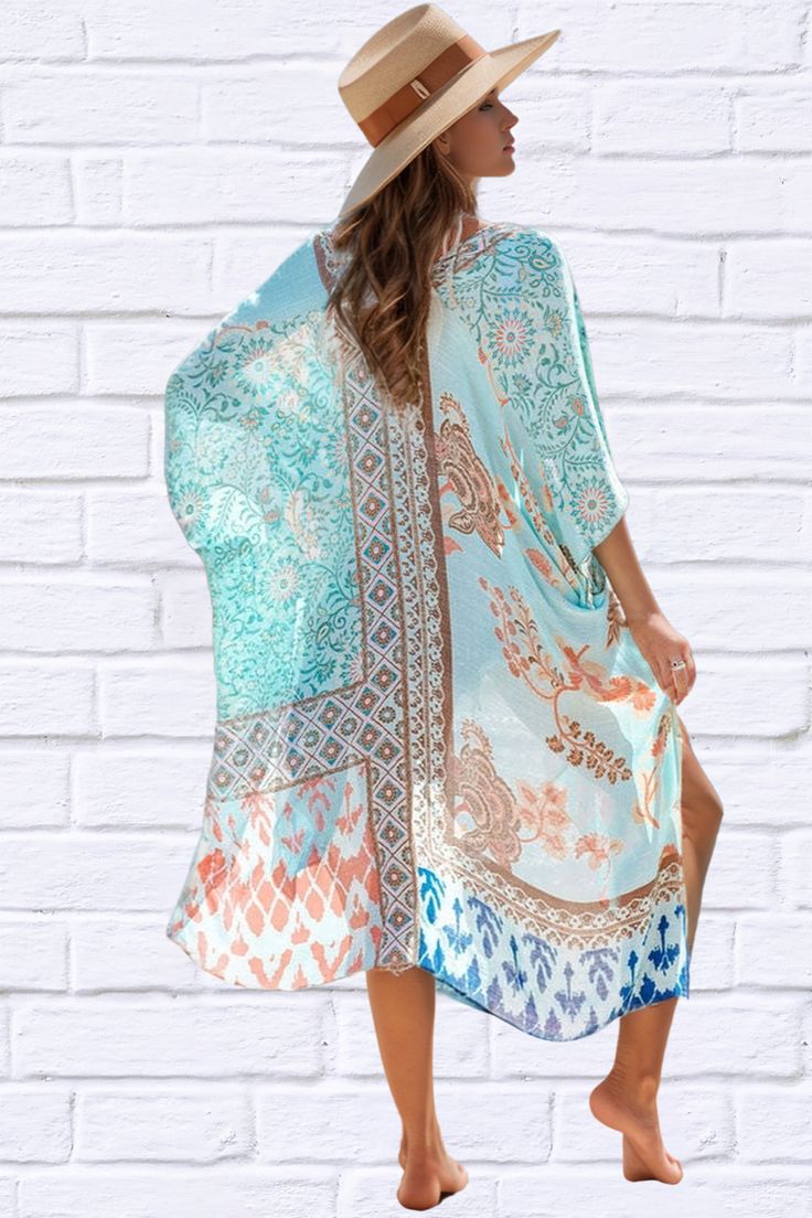 Introducing our Printed Open Front Cover-Up Kimono, a must-have addition to your beachwear collection. Crafted with lightweight fabric and featuring a vibrant printed design, this kimono adds a touch of elegance and flair to any swimwear ensemble. With its open front style, it effortlessly drapes over your shoulders, providing just the right amount of coverage while still allowing your swimsuit to peek through. The loose and flowy fit ensures comfort and breathability on hot summer days. Perfect V-neck Patterned Kimono For Festival, Vacation Beach Cover-up Kimono With Kimono Sleeves, Multicolor Summer Kimono For Beach Cover-up, Floral Print Open Front Cover-up For Vacation, Summer Floral Print Wrap Cover-up, Casual Multicolor V-neck Kimono, Beachy Printed Pool Cover-up, Printed Beach Cover-up With Kimono Sleeves, Casual Patterned Kimono For Beach Cover-up