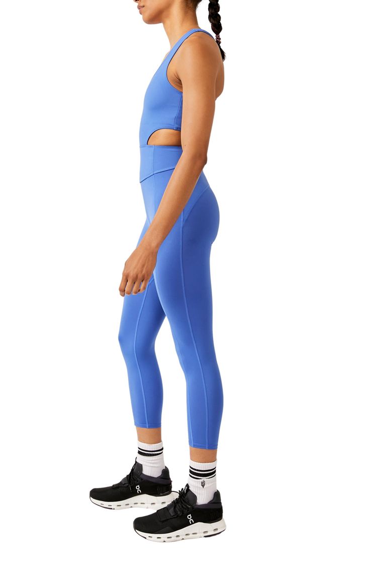 Make a run for it in this cardio-ready jumpsuit cut from a stretchy, buttery-soft knit with a bold, strappy back and the light support of a built-in shelf bra. 23" inseam; 9" leg opening (size Medium) Scoop neck Built-in shelf bra 80% polyester, 20% elastane Machine wash, tumble dry Imported Spring Workout Solid Color Jumpsuits And Rompers, Summer Workout Unitard Made Of Elastane, High Stretch Elastane Unitard For Workout, Summer Workout Unitard In Elastane, Summer Workout Elastane Unitard, Sporty High Stretch Elastane Jumpsuit/romper, Sporty Micro-elastic Unitard For Workout, Sporty Micro-elastic Unitard For Sports, Spring Activewear With Thumbholes For Sports