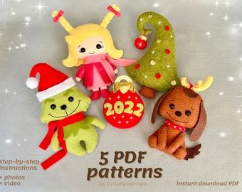 there are five different stuffed animals with numbers on the front and one has a christmas ornament