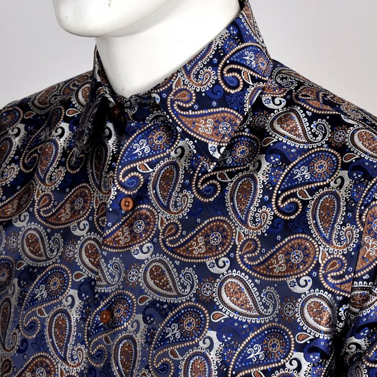 Kensington Paisley Jacquard Shirt Elevate Your Style with a Touch of Sophistication. Add elegance to your wardrobe with our stunning Paisley Jacquard Shirt. This shirt is made from high-quality materials and features an intricate paisley jacquard pattern that adds depth and texture to your look.  Product Details: Made from 100% polyester for a comfortable fit Classic collar and button cuffs for a timeless look Relaxed fit for stylish and comfortable wear Perfect for formal events, weddings, or s Spring Suit, Jacquard Shirt, Paisley Shirt, Brand Magazine, Artisan Gift, Jacquard Pattern, Blazer With Jeans, Fashion Jewellery, Independent Designers Fashion