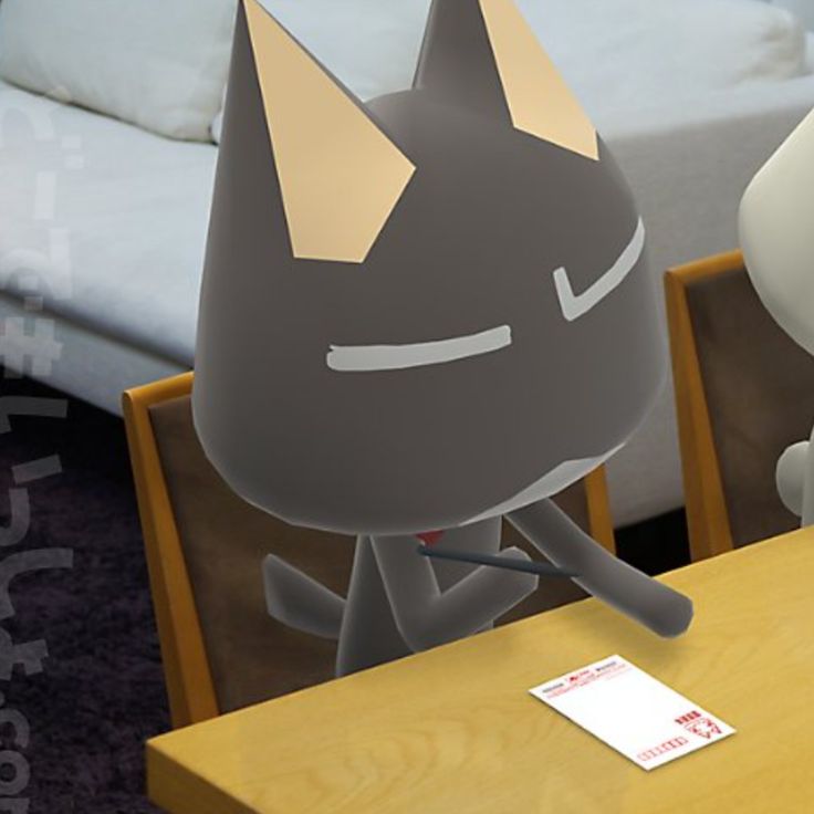 an animated cat sitting at a table in front of a bed