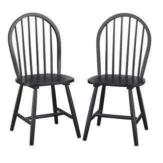 two black wooden chairs side by side