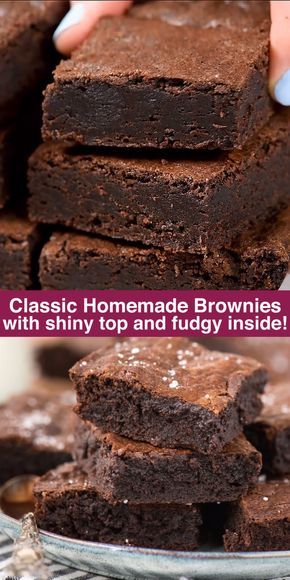 chocolate brownies with shiny top and fudge inside are stacked up on a plate