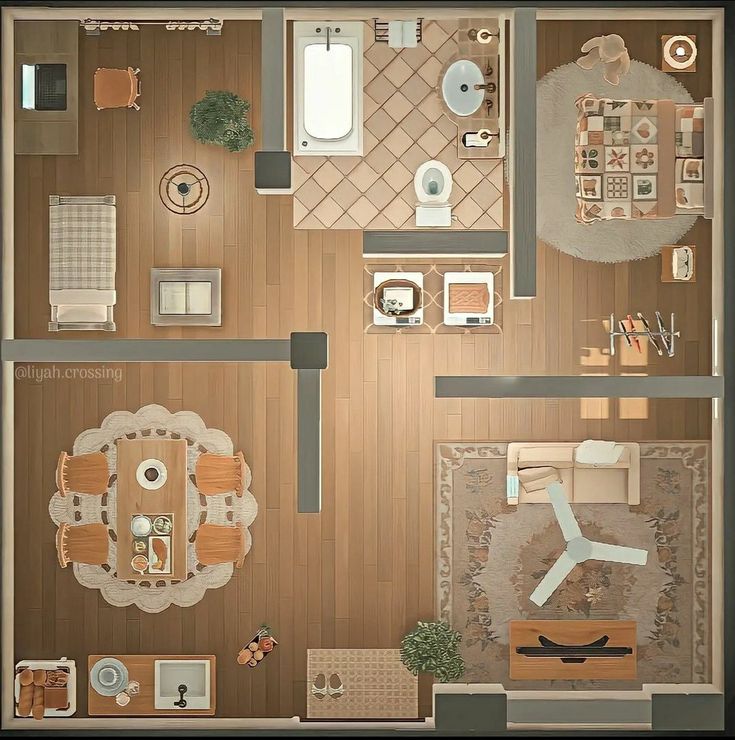 an overhead view of a living room and dining area in a house with wood flooring