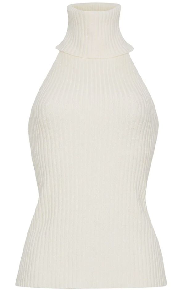 SAMSON TOP | 969 The comfy yet tight fitting Samson Top is a ribbed knit open back halter with a luxurious, oversized turtleneck. The vertical rib knit stitch creates a figure-flattering silhouette. • 70% Wool, 30% Cashmere • Ribbed knit • Body con fit This garment is special and might stretch over time if hung. To preserve its shape, we recommend taking extra care and folding. Casual Glamour, Oversized Turtleneck, Shopping Event, Knit Stitch, Event Styling, Skirt Top, Girls Shopping, All Fashion, Style Guides