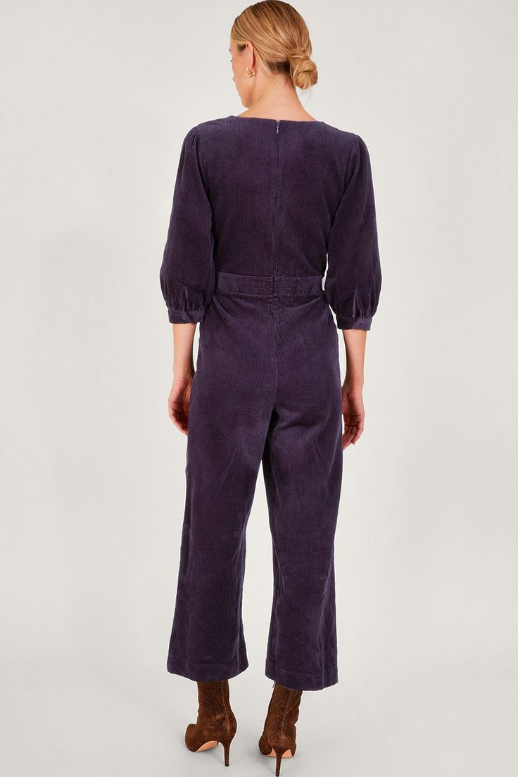 It's cord season. Suitable for any time of the day, this purple jumpsuit features cropped blouson sleeves, a defined waist and kick flare trousers. Evening plans? Just slip on some boots. As part of the journey to make our clothes kinder to the world around us, this item was made using more sustainable raw materials, such as organic cotton, recycled polyester and viscose from responsibly grown forests. Purple Jumpsuit, Defined Waist, Party Skirt, Kick Flares, Flare Trousers, Navy Dress, Embellished Dress, Denim Outfit, Jeans For Sale