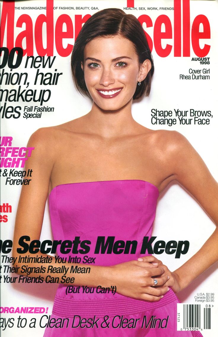 a magazine cover with a woman in a strapless dress on it's front