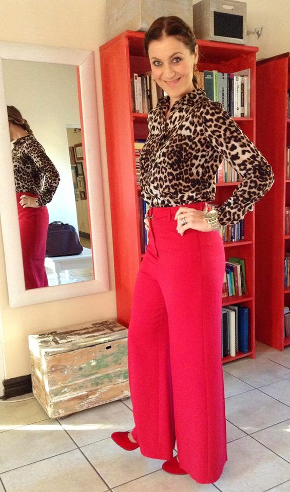 Leopard print blouse: YDE, Red high waisted pants:Truworths. Shoes; Queenspark: Earrings: citymob.co.za Red Trousers Outfit Classy, High-waisted Leopard Print Bottoms For Fall, Red Wide-leg Pants For Office, Leopard Print And Red Outfits, Red Pants Leopard Shirt, Red Top Leopard Skirt, Red Blouse Outfit, Red Trousers Outfit, Red High Waisted Pants