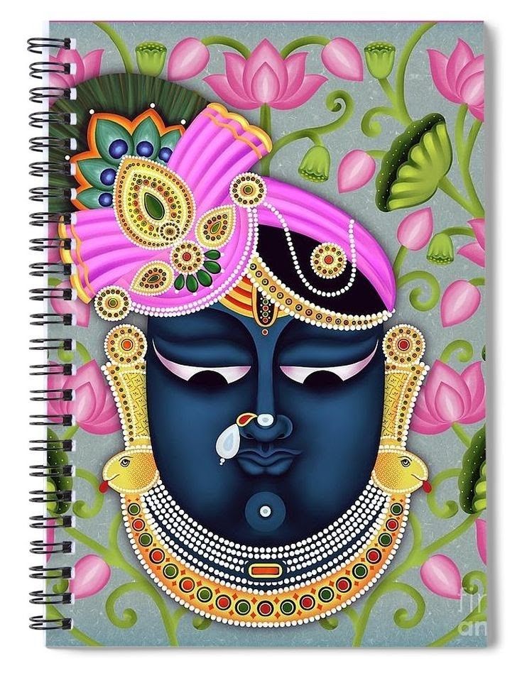 a painting of a buddha face with flowers in the background spiral notebook featuring an image of a