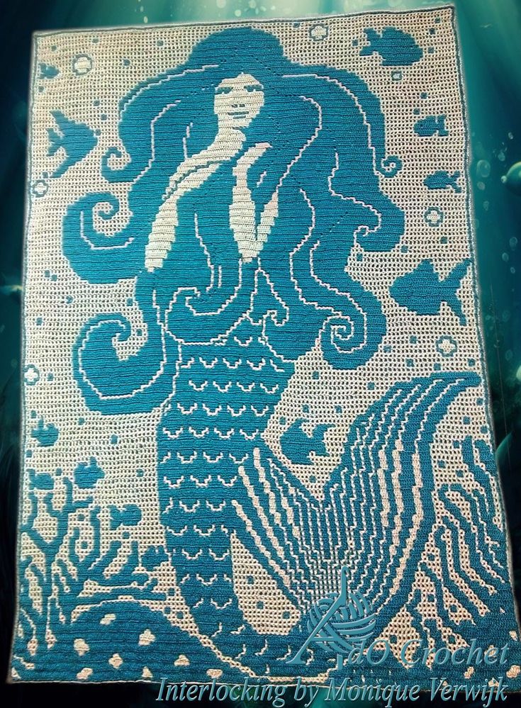 an image of a mermaid with long hair on it's back, in the water