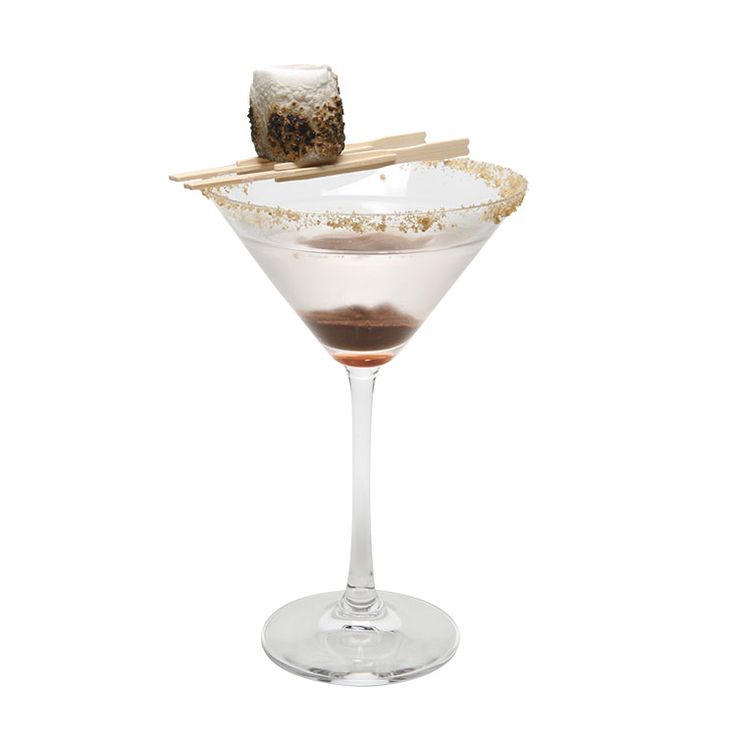 a martini glass filled with an alcoholic drink and garnished with a piece of wood