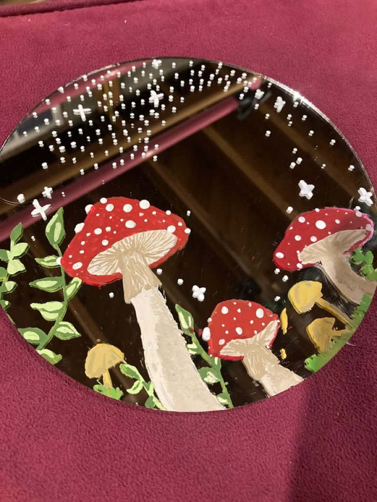 a mirror that has some mushrooms on it