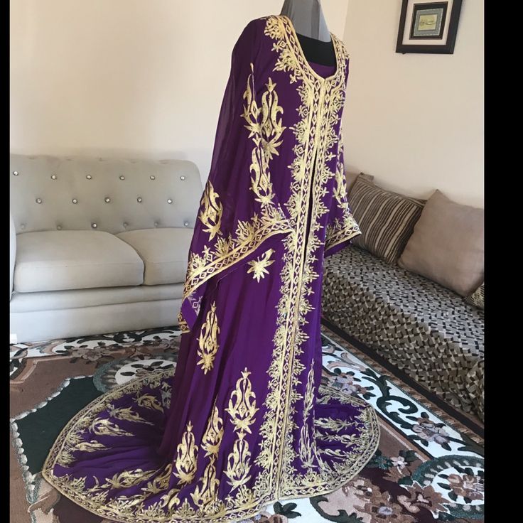 It’s Been Worn Twice And It’s A Two Peace. It’s Worn With A High Waist Belt Traditional Purple Kaftan For Festive Occasions, Festive Purple Tunic Dress, Purple Embroidered Kaftan For Eid, Long Sleeve Purple Party Kaftan, Bohemian Style Long Purple Thobe, Purple Maxi Dress For Eid, Long Purple Festive Kaftan, Purple Bohemian Long Thobe, Festive Long Purple Kaftan